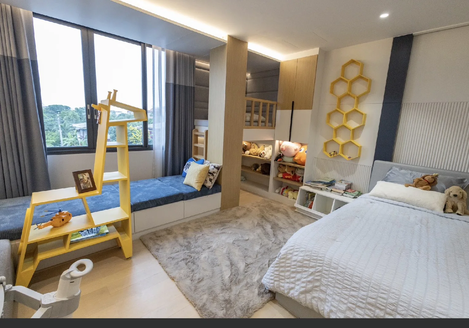 Bright family bedroom with built-in seating