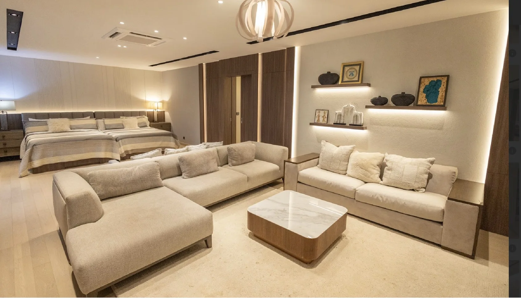 Expansive master bedroom with private lounge